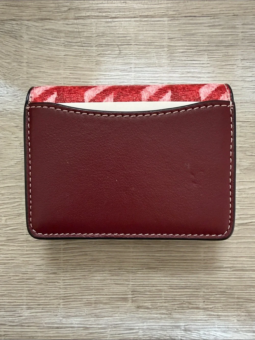 Coach Red and Pink Houndstooth Mini wallet with crossbody chain